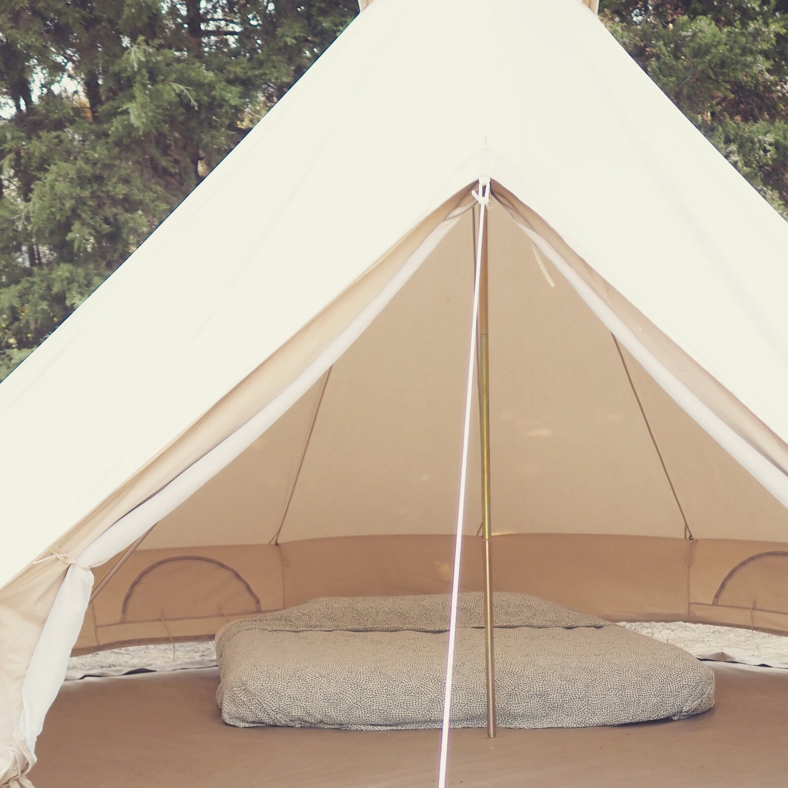 Comfort glamping bell tent interior for two