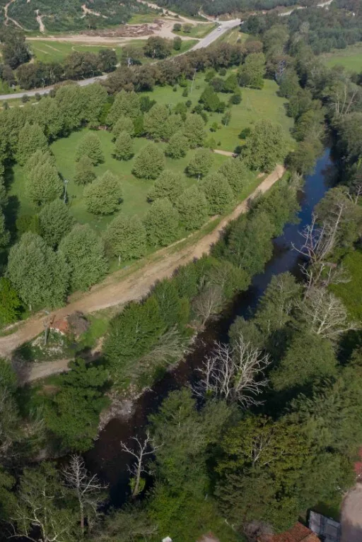Aerial view of the Ceira winding past the festival site